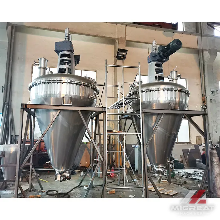Two DLH vacuum conical dryers with agitator drives in the workshop